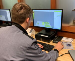 Cadet using 3D program on computer