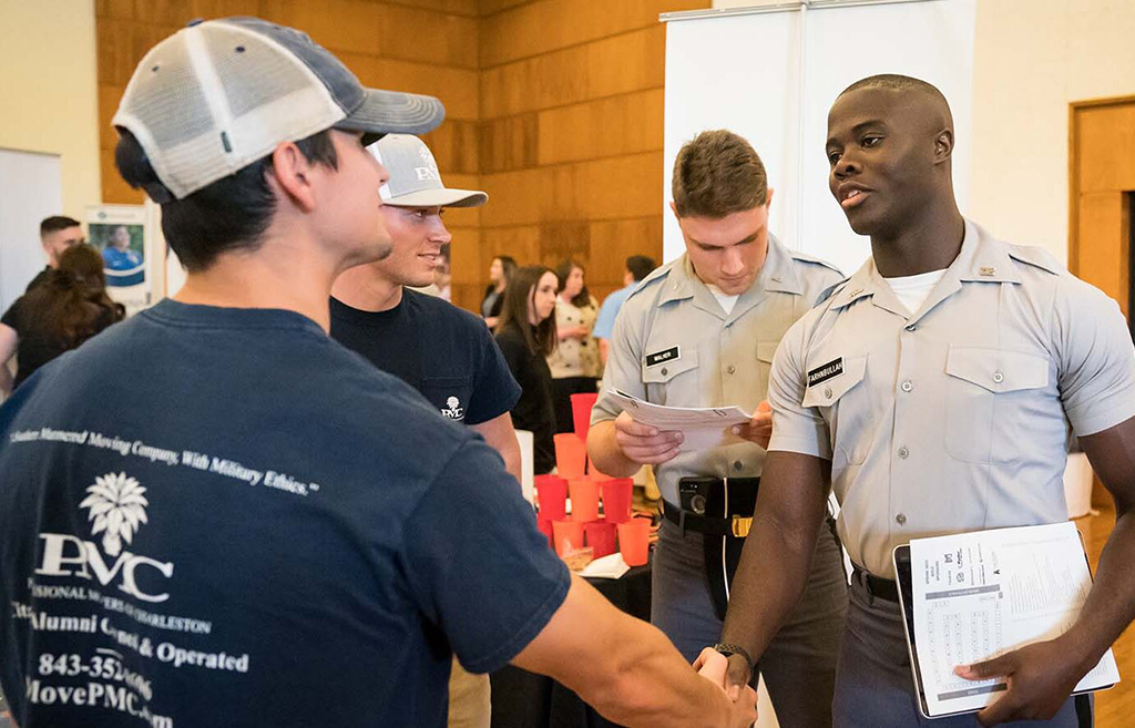 cadet shaking hands at career fair