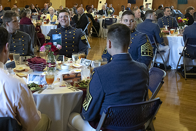 Photo of Authors and Editors at table.