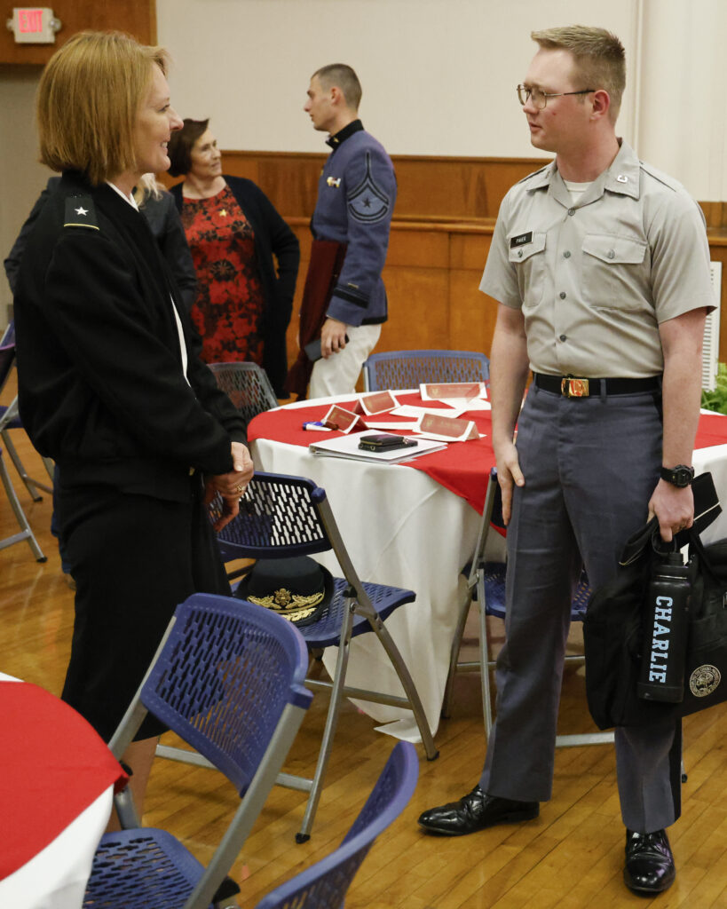 Dr. Sally Selden speaking with a cadet.