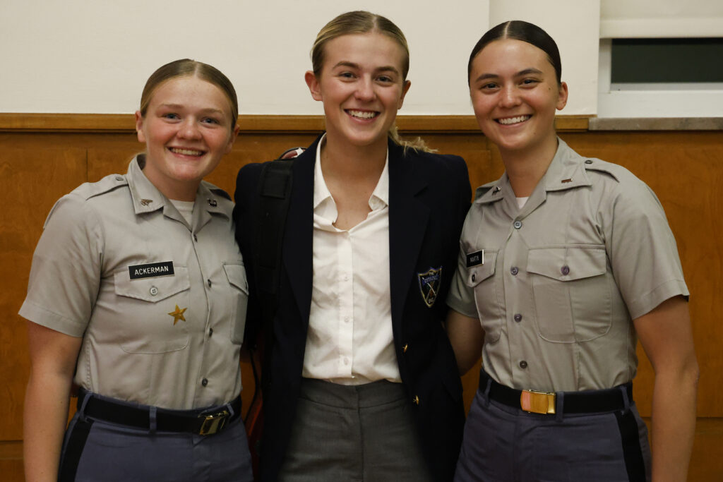 Lucy McArthur and two cadets posing for a photo.
