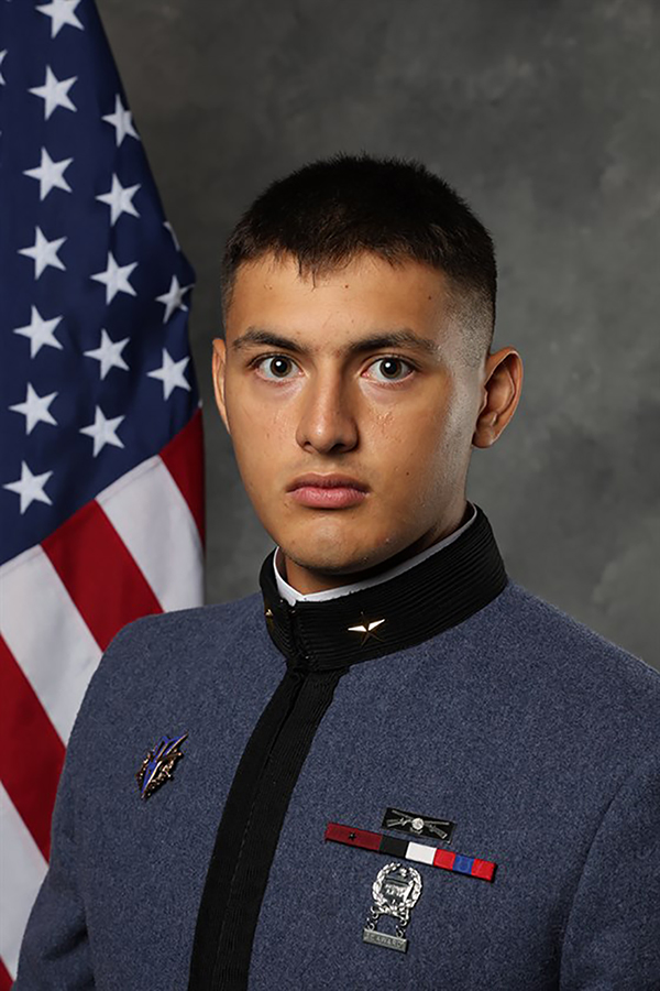 Anthony DiSalvo in front of an American flag