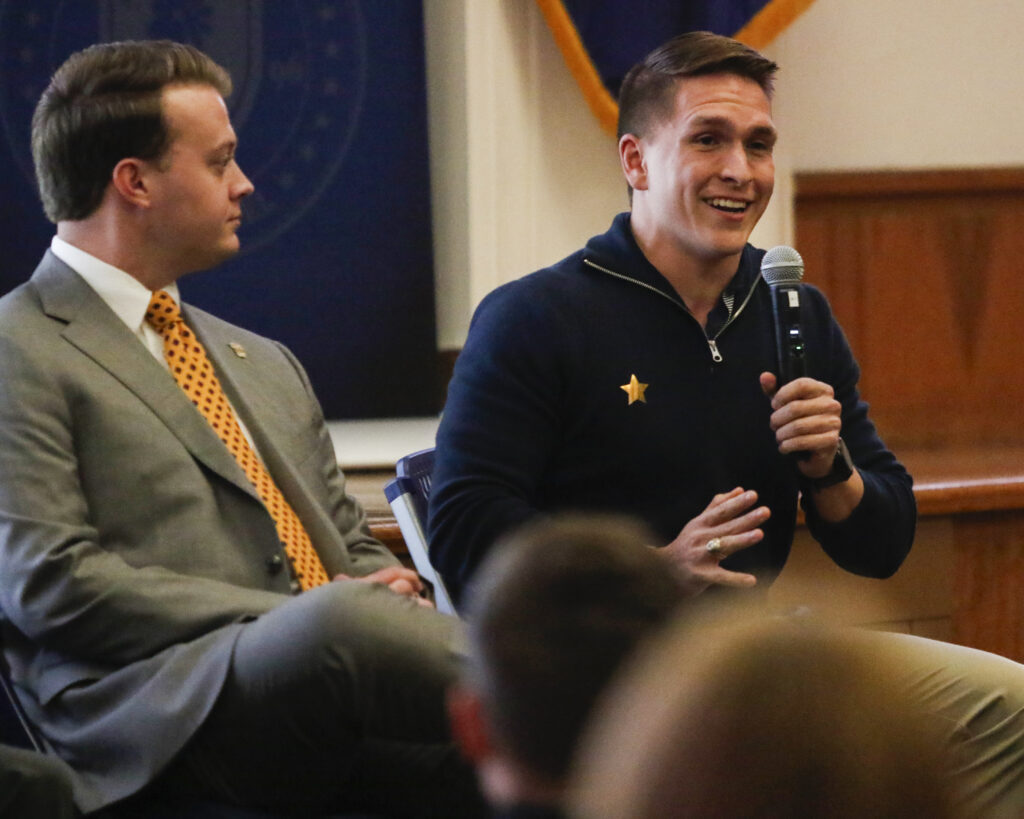 Panelist Ken Galsgaard '23 answering a question next to Mason Hand '23.