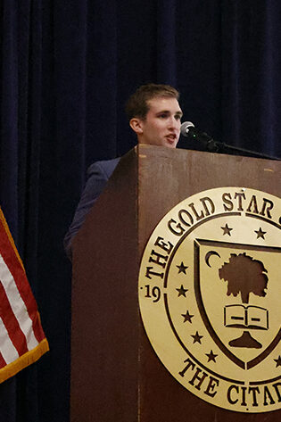 Corbin Menz speaking about his published work in The Gold Star Journal.