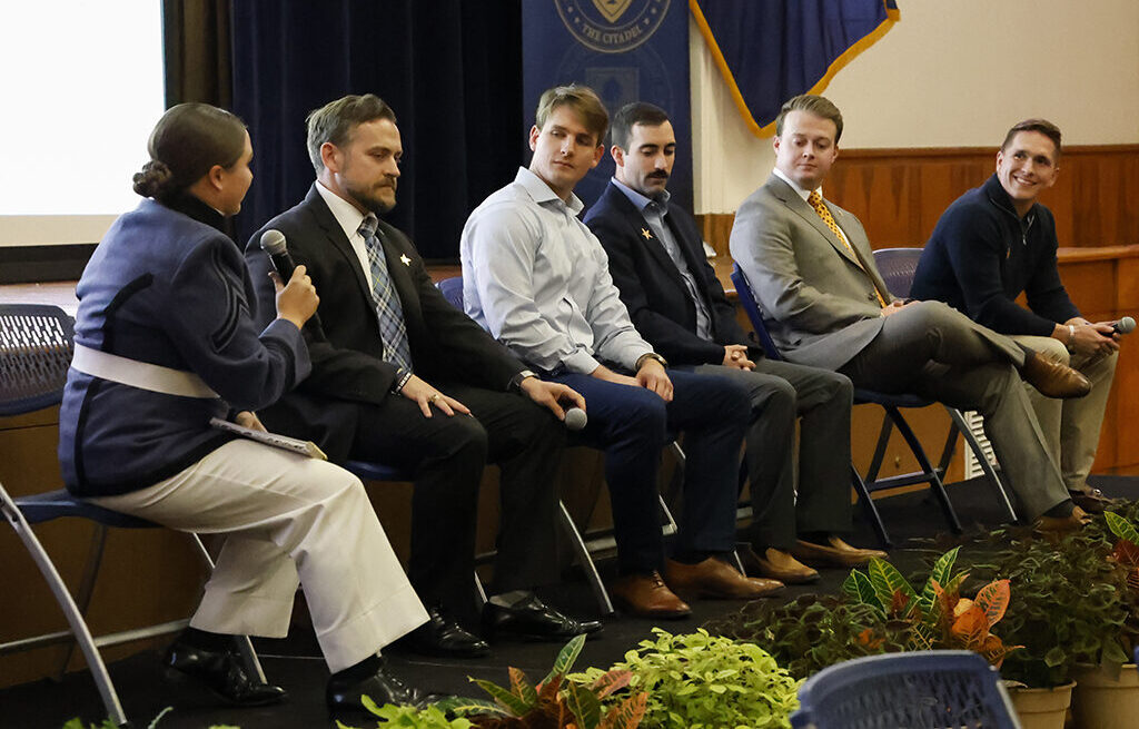 Group photo of all panelists being asked a question from Kaitlyn Hatchew, (Editor). Pictured from left to right: Eric Zink '99, Gage Timberlake '25, Miguel Parrado '16, Mason Hand '23, Ken Galsgaard '23.