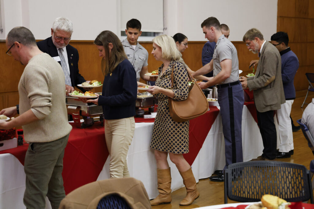 Guests getting food at the buffet.