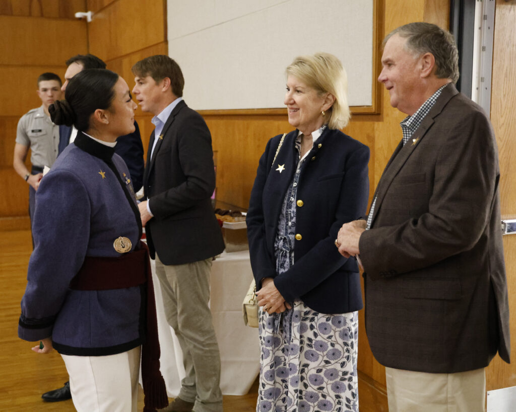 Kanjanika Kincaid talking with guests.