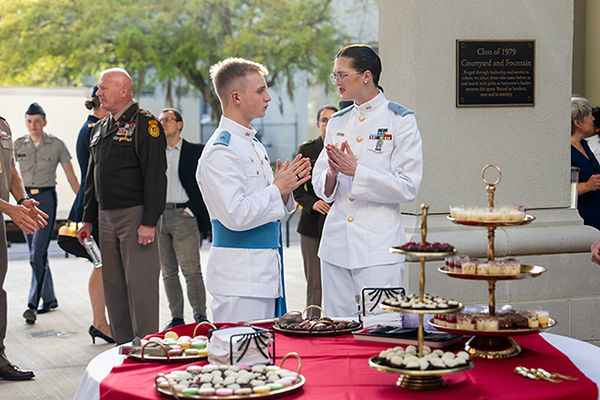 Editor Patrick Burns and Author Palmer Carroll speaking before the Gold Star Journal Academic Conference