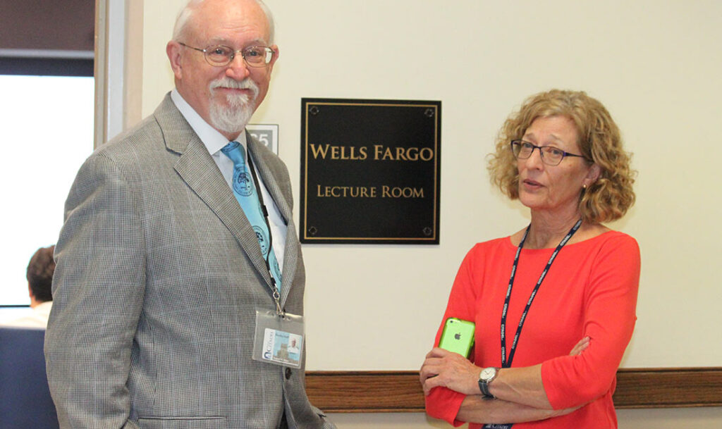 BG Samuel Hines, Provost and Dean of the College with Librarian Elise Wallace