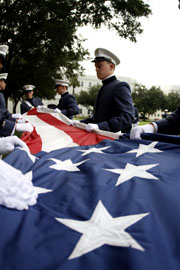 Inside Cover Photograph taken off the folding of the American Flag by cadets.