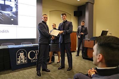 James Quimby presenting the Best Photograph Award to Morgan Meredith.