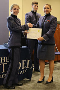 Sierra Morris presenting Erika Sineath with her Certificate of Publication.