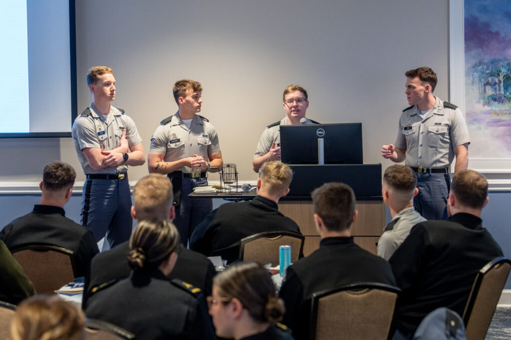 Four cadets give a presentation to Honor Conference attendees.