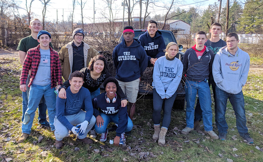 Group of Citadel volunteers poses together on Alternative Break project.