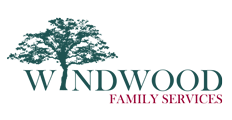 Windwood Family Services logo featuring a stylized landscape design.