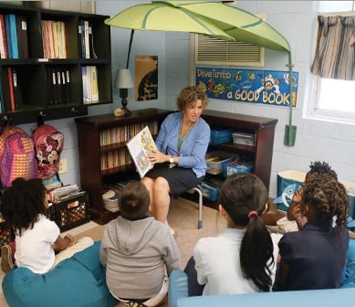 Teacher reading to students