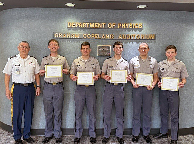 The Citadel cadets stand with professor at the University Physics Competition