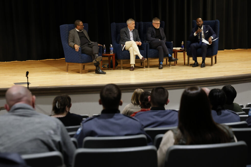 A panel in Capers Auditorium featuring three former CIA Chiefs of Station, including Glen Corn, Kevin Higgins and Ted Singer.