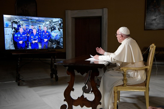Pope Francis speaks by video with astronauts aboard the International Space Station.