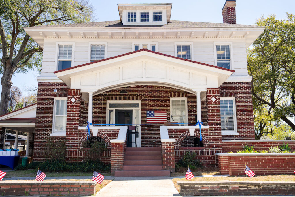 The new Veteran Student Success Center, opened on March 19, 2026 is a prominent brick house located in downtown Charleston.
